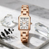 Reloj HANNAH MARTIN LUPE oro rosa sobre mármol blanco con prismas de cristal